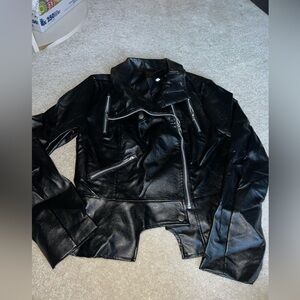 Unique Cut Black Leather Jacket